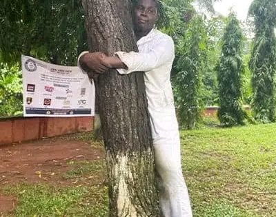 Ghanaian Journalist Sets New World Record for Longest Tree Hug