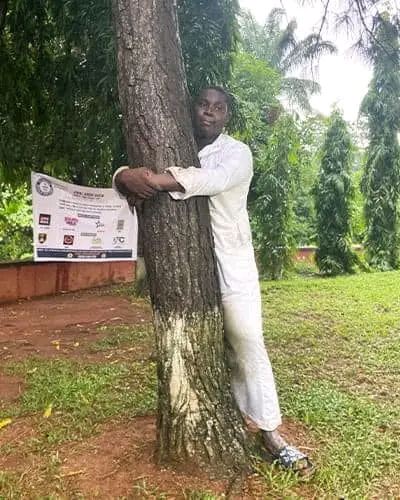 Ghanaian Journalist Sets New World Record for Longest Tree Hug