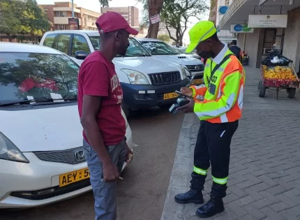 Outrage As Bulawayo Parking Company Owner Drives Into City Hall With A Rolls-Royce