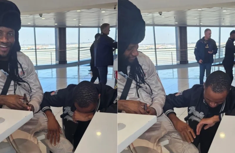 Pics: Fan Bursts into Tears After Meeting Winky D at the Airport